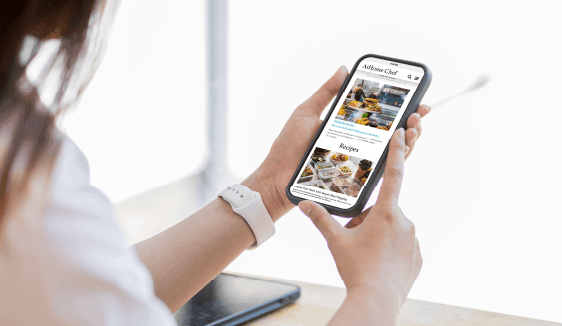 Image showing a digital ad on a phone with a map or nearby store notification.