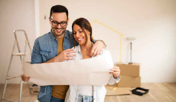 A couple looking at planning documents