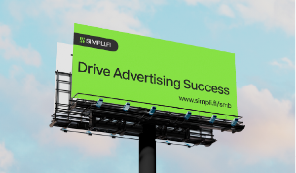 A billboard that reads "Drive Advertising Success"