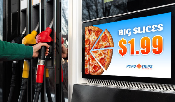 Pizza advertisement at a gas station