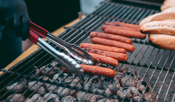 Hot dogs grilled on a bbq