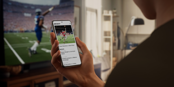 A person looking at an ad on their mobile device