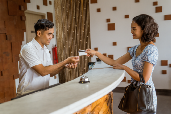 Woman at the front desk in a hotel
