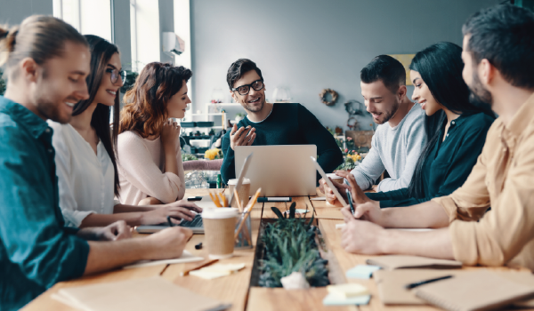 Marketer in the office with their team