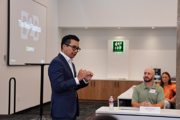 B2B marketers discussing demand generation strategies and buyer intent data at the Simpli.fi B2B Summit in Fort Worth.