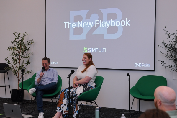 B2B marketers discussing demand generation strategies and buyer intent data at the Simpli.fi B2B Summit in Fort Worth.